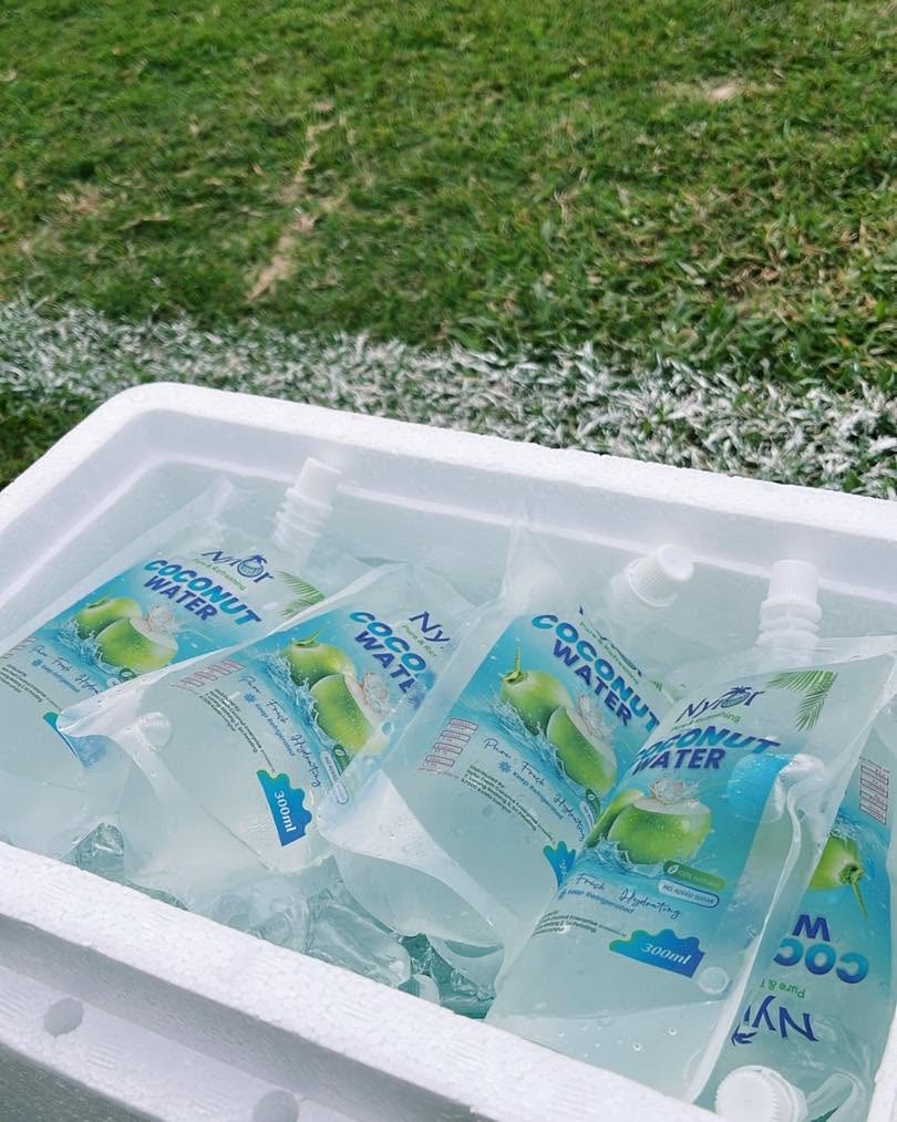Nyior coconut water pouches packed in an ice box